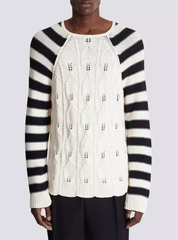 Maglione lavorato a trecce Maglione lavorato a trecce