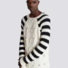 Maglione lavorato a trecce Maglione lavorato a trecce