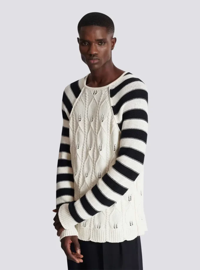 Maglione lavorato a trecce Maglione lavorato a trecce