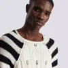 Maglione lavorato a trecce Maglione lavorato a trecce