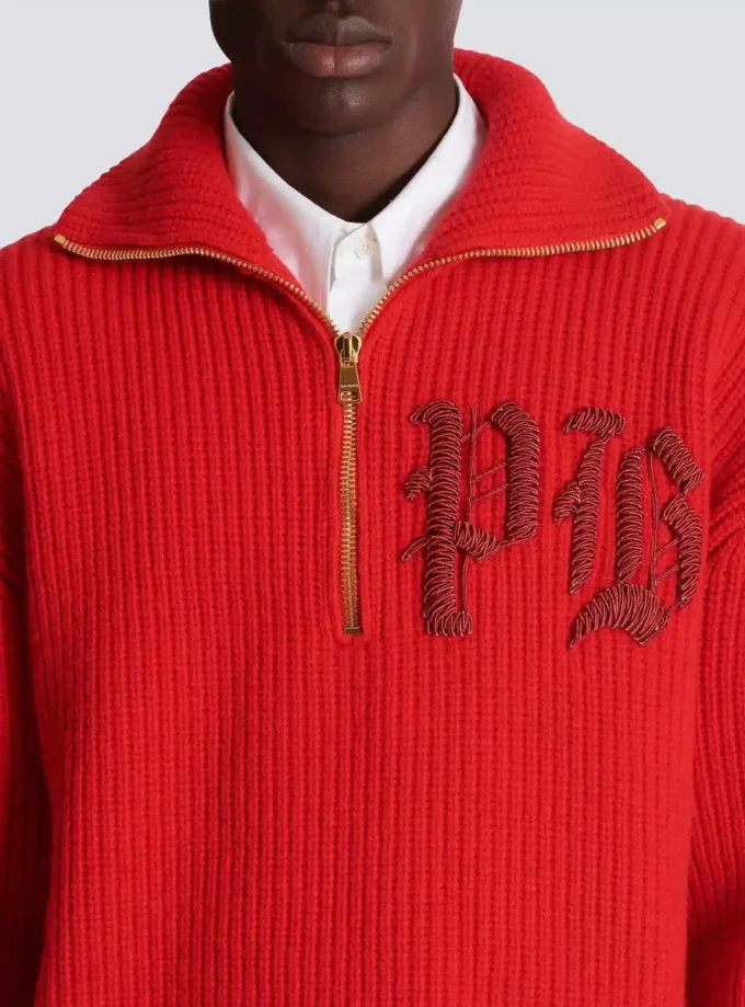 Maglione lavorato a trecce Maglione lavorato a trecce