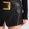 Minigonna in pelle con cintura
