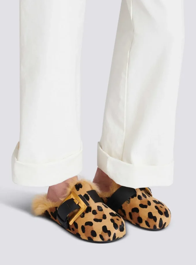 Mules Anthem in pelle di cavallino con stampa leopardata e pelliccia sintetica Mules Anthem in pelle di cavallino con stampa leopardata e pelliccia sintetica