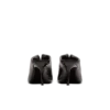 Mules in pelle di agnello con piercing frontale