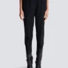Pantaloni a vita alta con motivo grain de poudre Pantaloni a vita alta con motivo grain de poudre