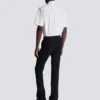 Pantaloni con pinces in grana di polvere Pantaloni con pinces in grana di polvere