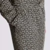 Pantaloni fluidi con monogramma