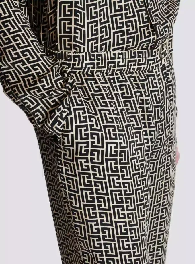 Pantaloni fluidi con monogramma