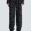 Pantaloni in crêpe con motivo Constellation in strass Pantaloni in crêpe con motivo Constellation in strass