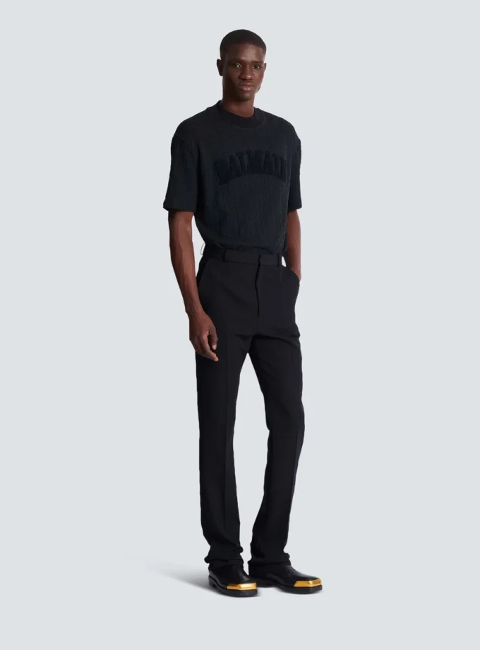 Pantaloni in lana con pinces Pantaloni in lana con pinces