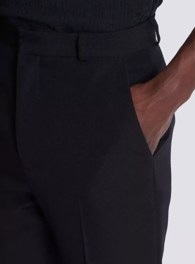 Pantaloni in lana con pinces Pantaloni in lana con pinces