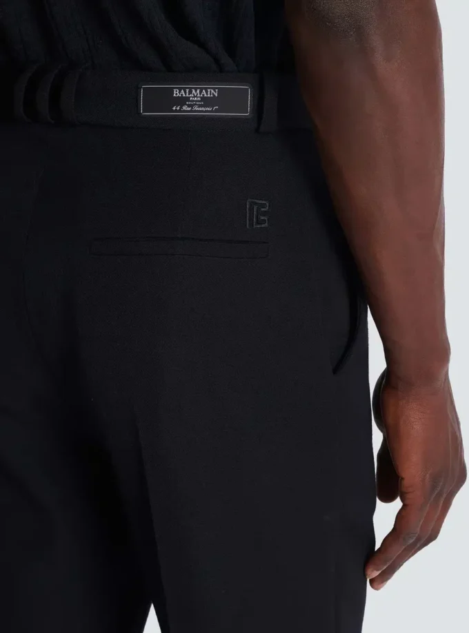 Pantaloni in lana con pinces Pantaloni in lana con pinces