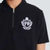 Polo a maniche corte con emblema College Polo a maniche corte con emblema College
