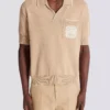 Polo in maglia con ricamo Balmain Écusson Polo in maglia con ricamo Balmain Écusson