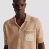 Polo in maglia con ricamo Balmain Écusson Polo in maglia con ricamo Balmain Écusson