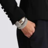 Set di bracciali rigidi con piercing