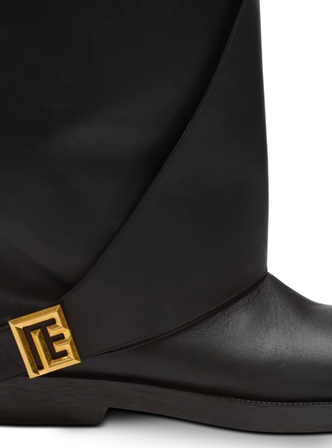 Stivali piatti in pelle intrecciata Stivali piatti in pelle intrecciata