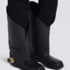 Stivali piatti in pelle intrecciata Stivali piatti in pelle intrecciata