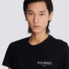 T-shirt con logo Balmain vintage in gel T-shirt con logo Balmain vintage in gel