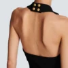 Top con scollo all’americana e lavorazione a trecce Top con scollo all’americana e lavorazione a trecce