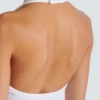 Top con scollo all’americana e lavorazione a trecce Top con scollo all’americana e lavorazione a trecce