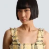 Top corto in tweed a quadri glitterato