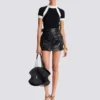Top in maglia a maniche corte Top in maglia a maniche corte