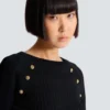 Top in maglia con bottoni Top in maglia con bottoni