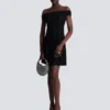 Top in maglia glitterata con spalle scoperte Top in maglia glitterata con spalle scoperte