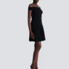 Top in maglia glitterata con spalle scoperte Top in maglia glitterata con spalle scoperte