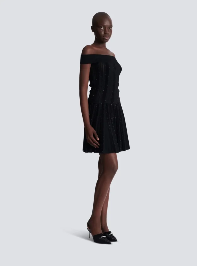 Top in maglia glitterata con spalle scoperte Top in maglia glitterata con spalle scoperte