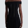 Top in maglia glitterata con spalle scoperte Top in maglia glitterata con spalle scoperte