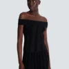Top in maglia glitterata con spalle scoperte Top in maglia glitterata con spalle scoperte